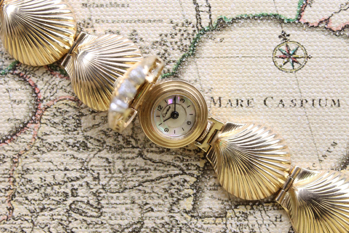 1950's Cartier Ladies 14K Shell Watch with Concealed Dial