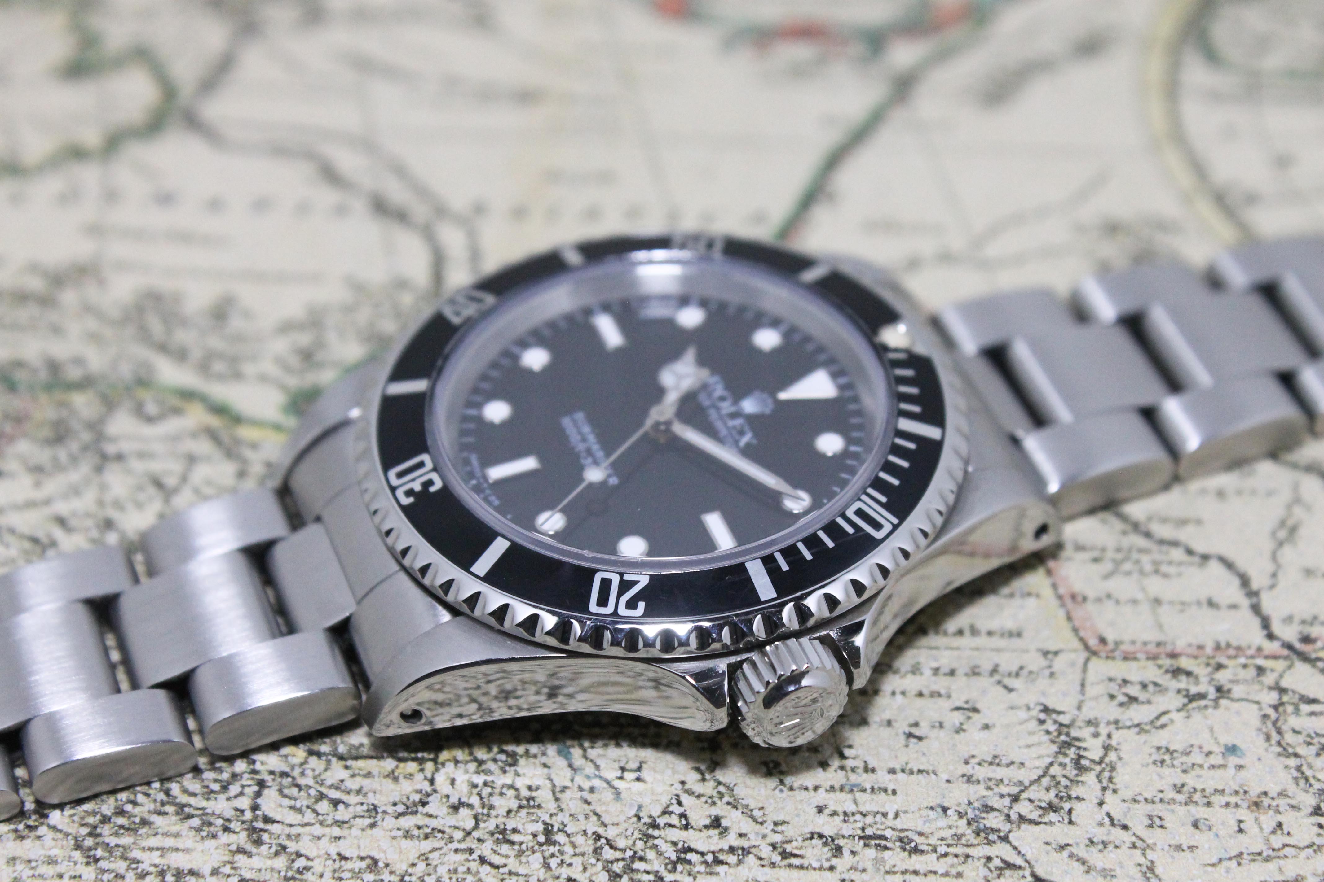 1991 Rolex Submariner Ref. 14060 (with Box & Papers)