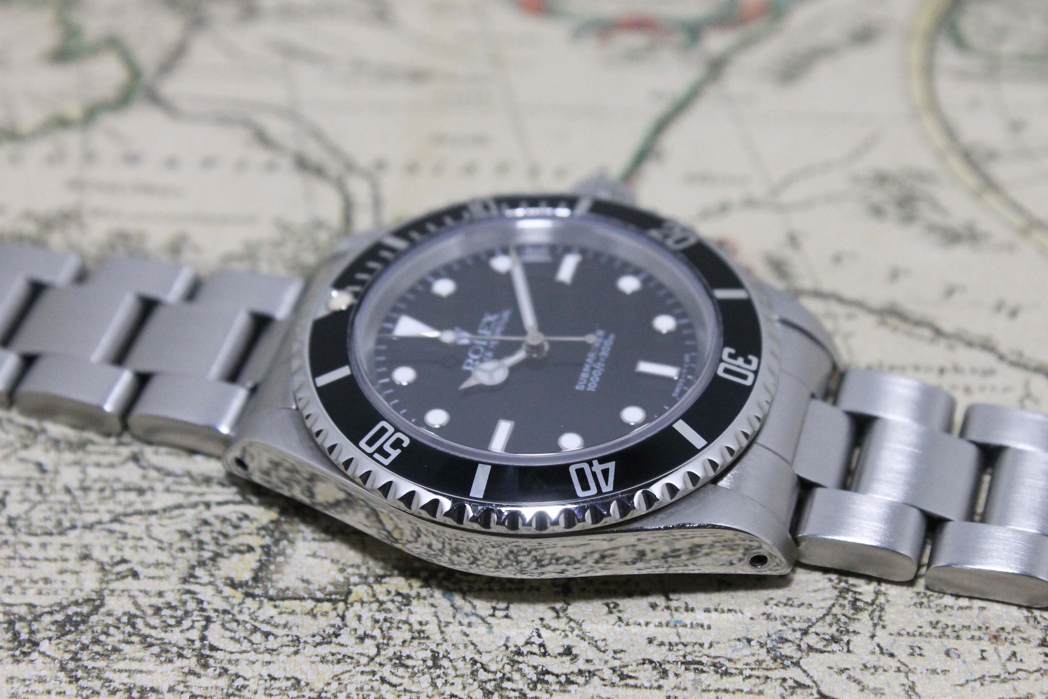 1991 Rolex Submariner Ref. 14060 (with Box & Papers)