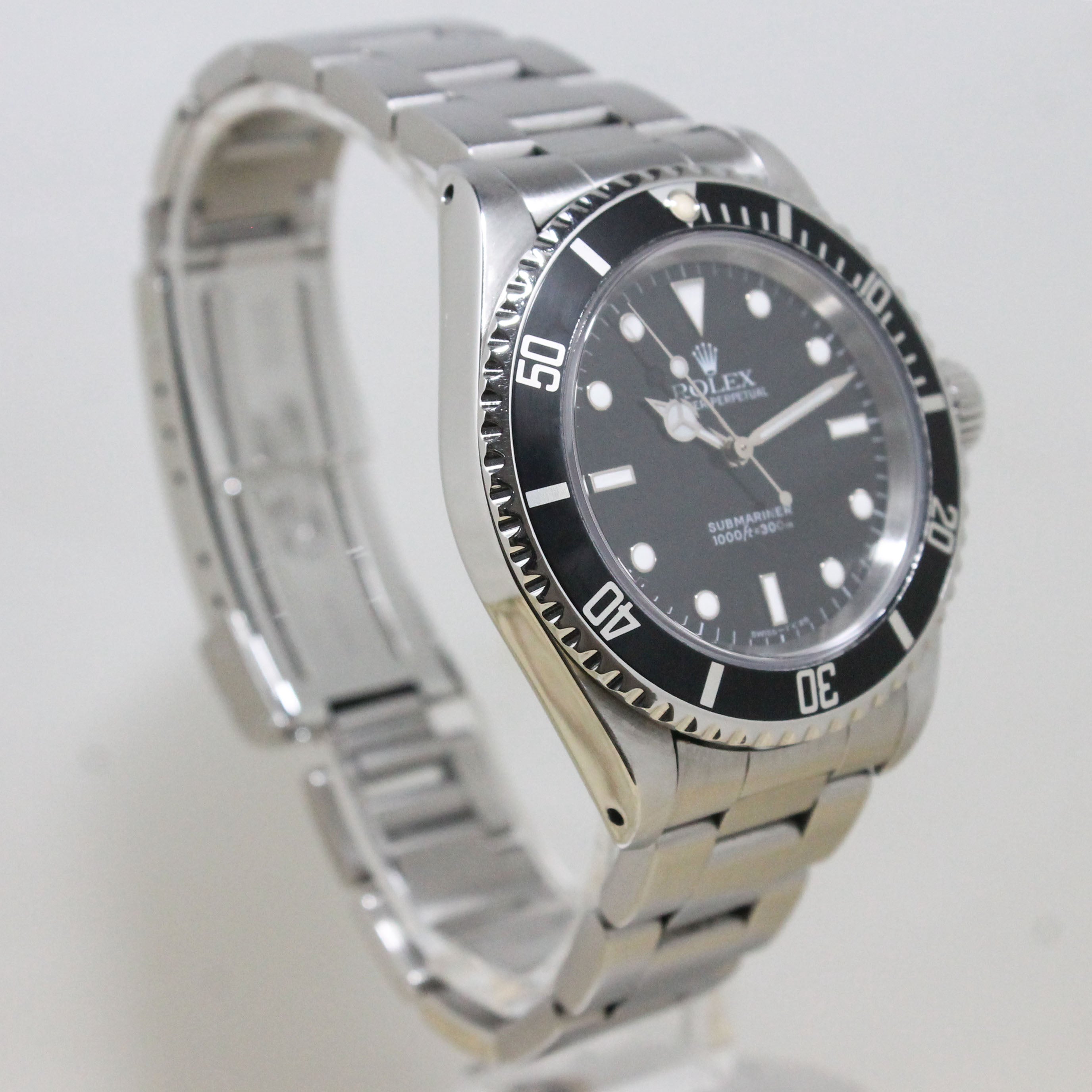 1991 Rolex Submariner Ref. 14060 (with Box & Papers)