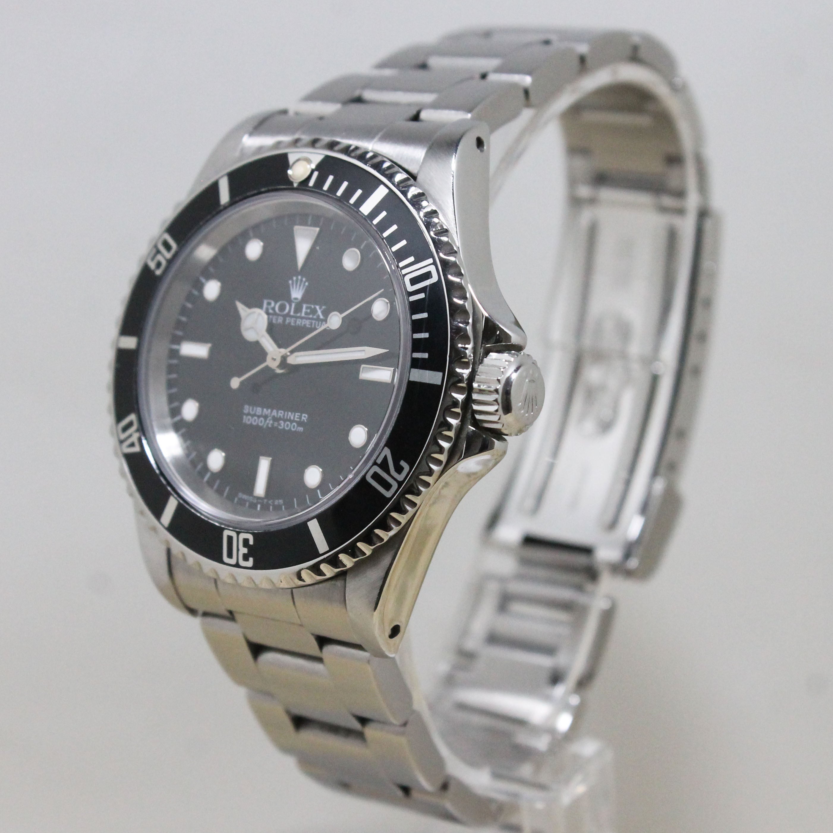 1991 Rolex Submariner Ref. 14060 (with Box & Papers)