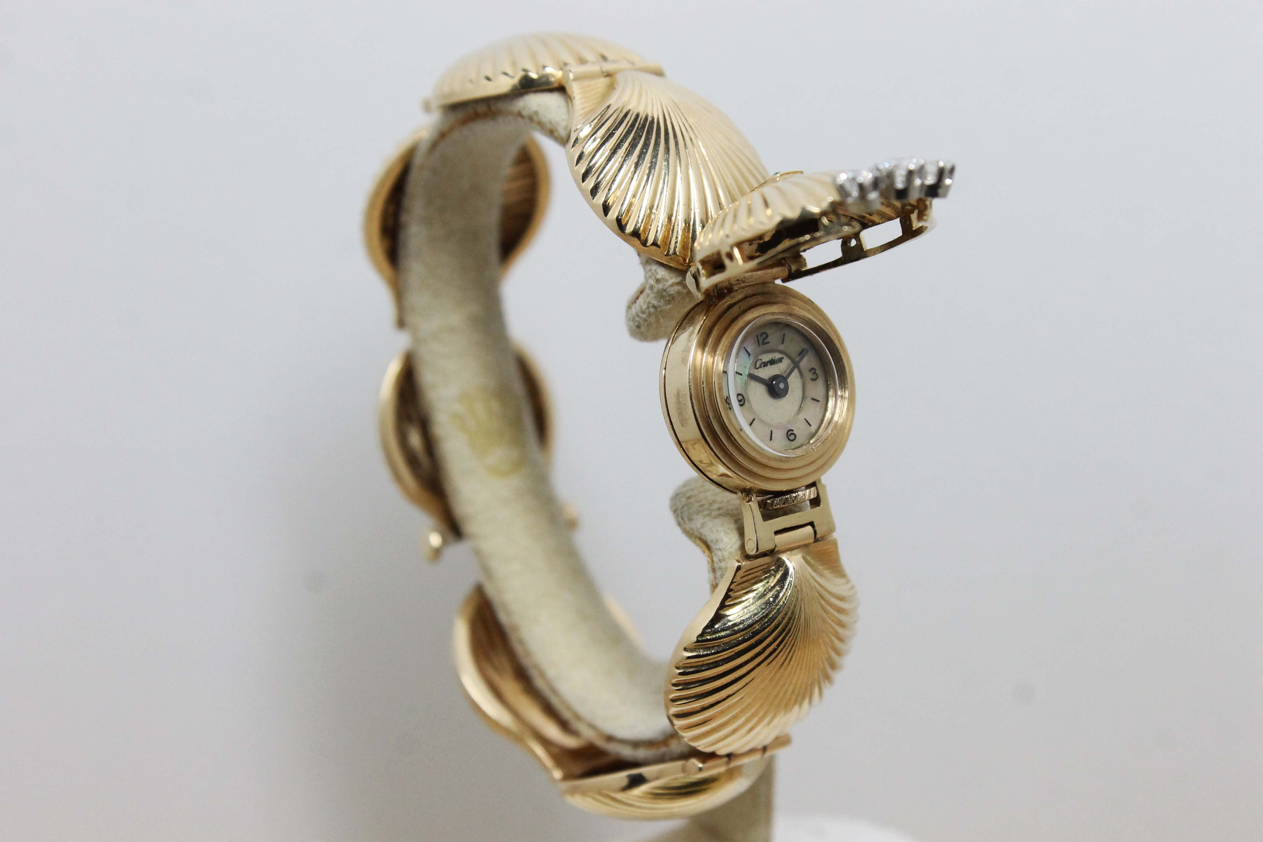 1950's Cartier Ladies 14K Shell Watch with Concealed Dial
