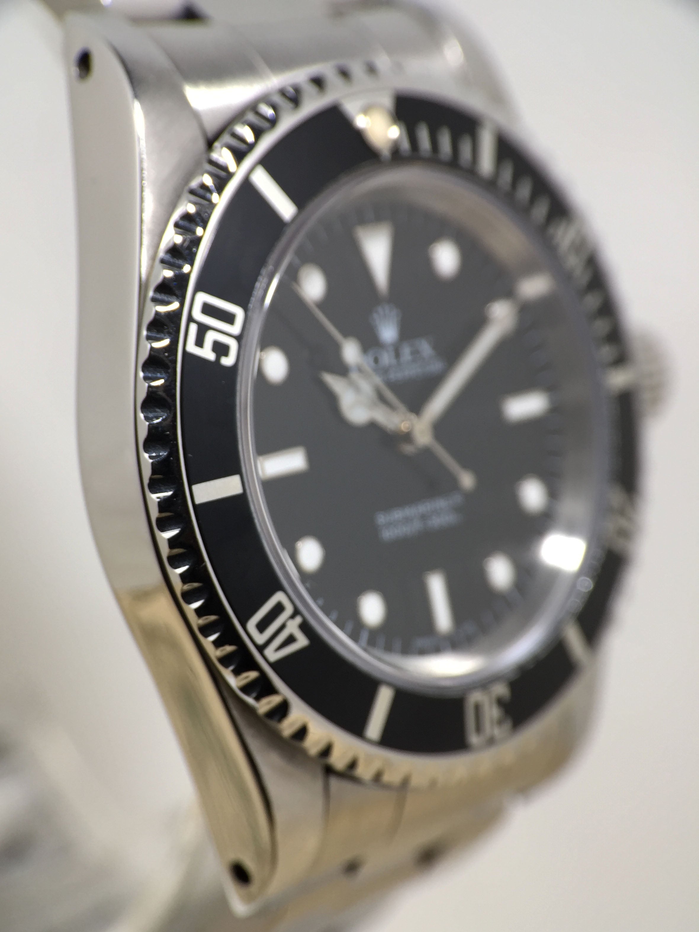 1991 Rolex Submariner Ref. 14060 (with Box & Papers)