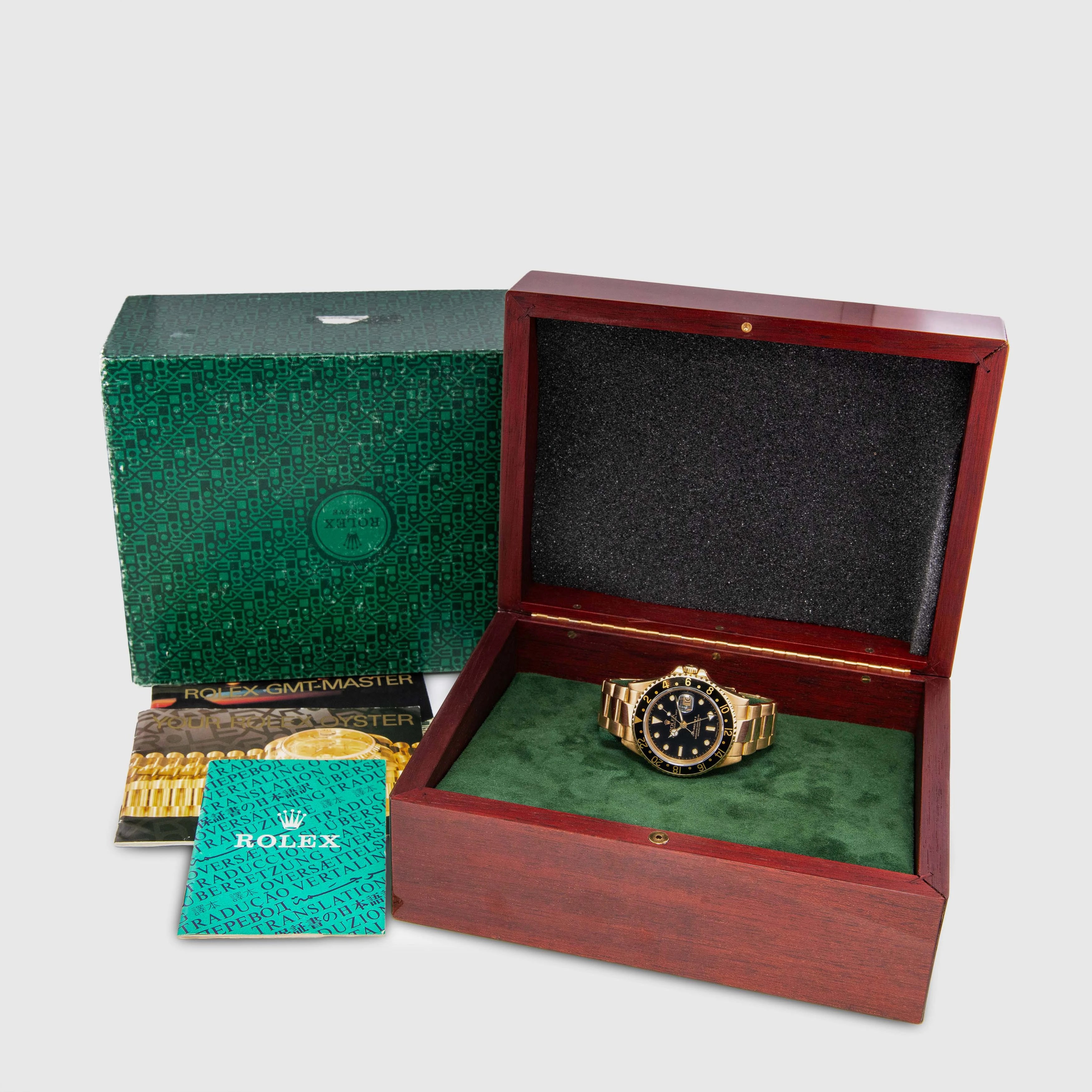 1990 Rolex GMT Master II Yellow Gold Black Dial Ref. 16718 (Box & Booklets)