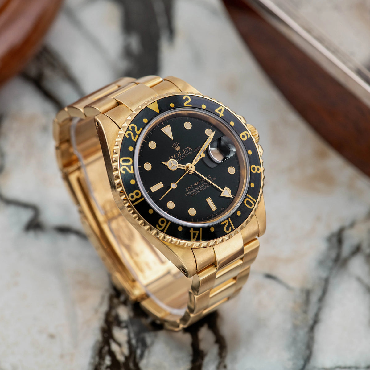 1990 Rolex GMT Master II Yellow Gold Black Dial Ref. 16718 (Box & Booklets)