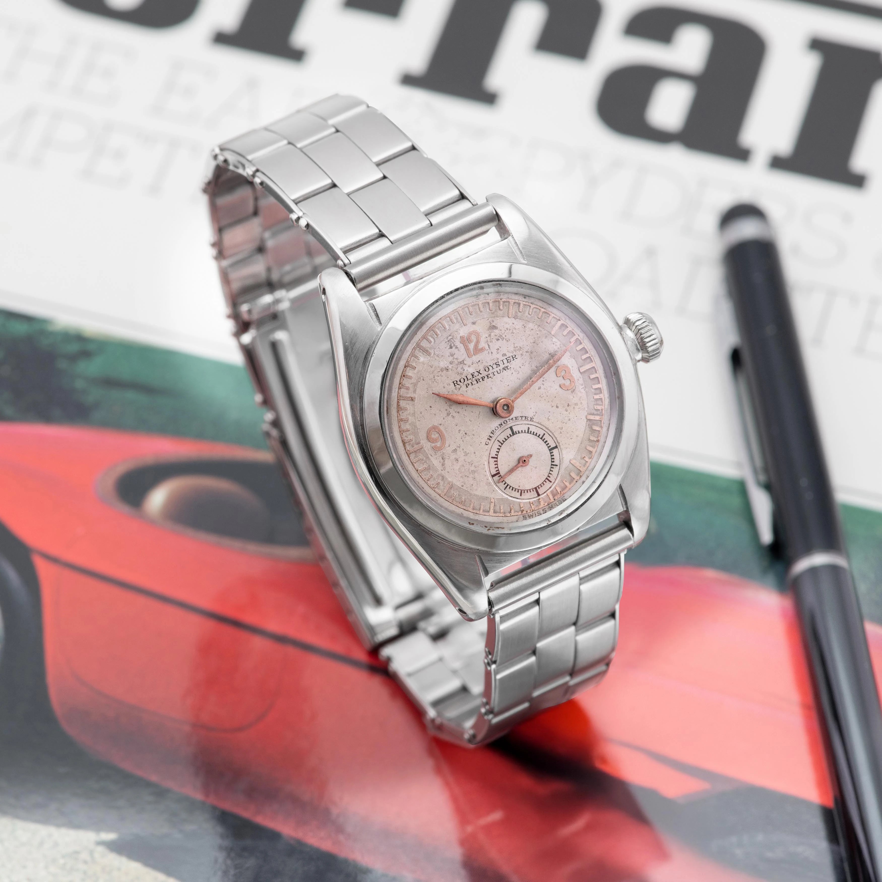 1941 Rolex Bubbleback Stainless Steel White & Pink Gold dial Ref. 2764