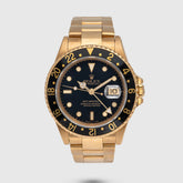 1990 Rolex GMT Master II Yellow Gold Black Dial Ref. 16718 (Box & Booklets)