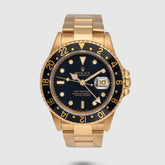 1990 Rolex GMT Master II Yellow Gold Black Dial Ref. 16718 (Box & Booklets)