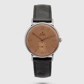1940 Rolex Dress Watch Stainless Steel Salmon dial retailed by Beyer Ref. 4051