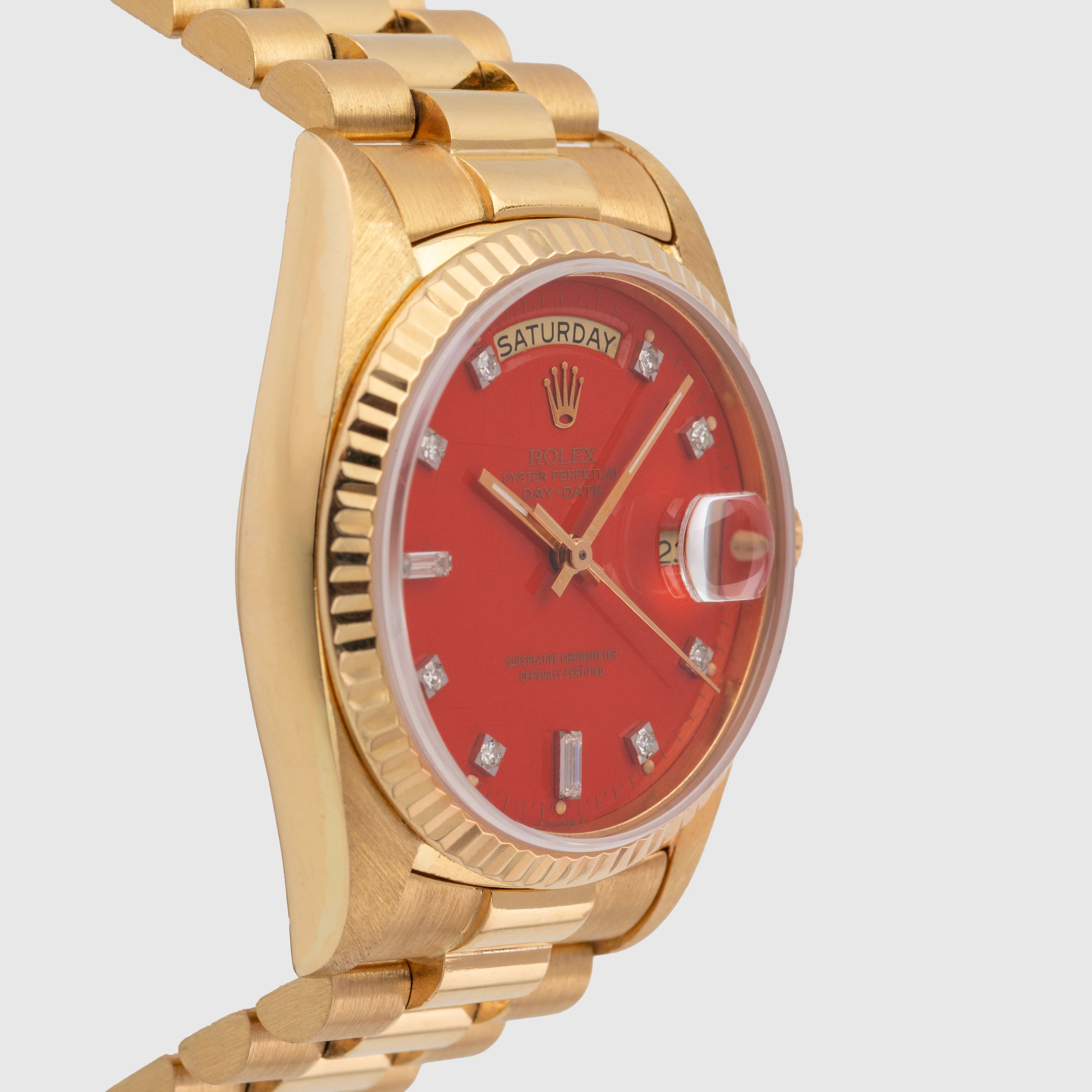 1987 Rolex Day Date Red Stella Diamond Dial Ref. 18038 (with Papers)