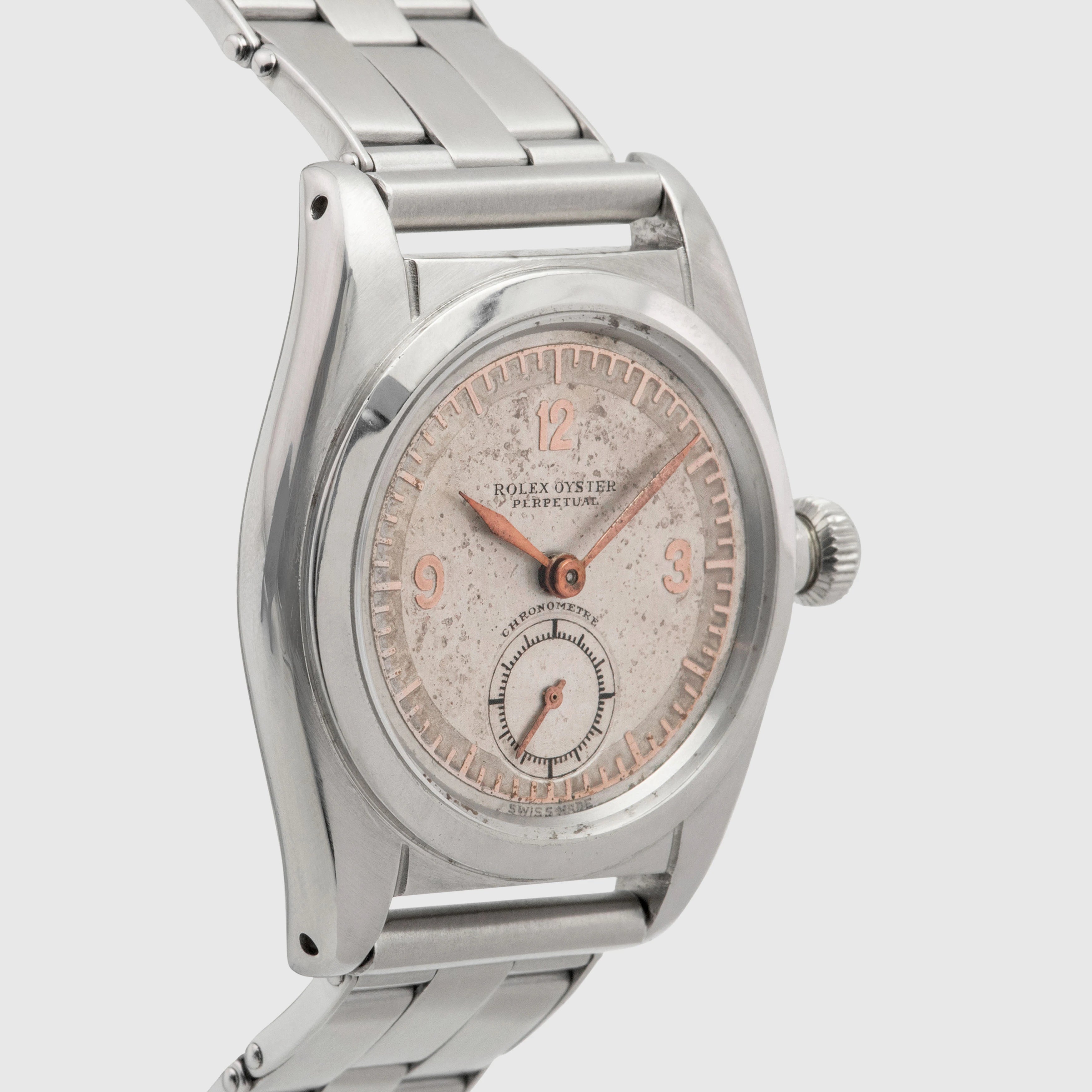 1941 Rolex Bubbleback Stainless Steel White & Pink Gold dial Ref. 2764
