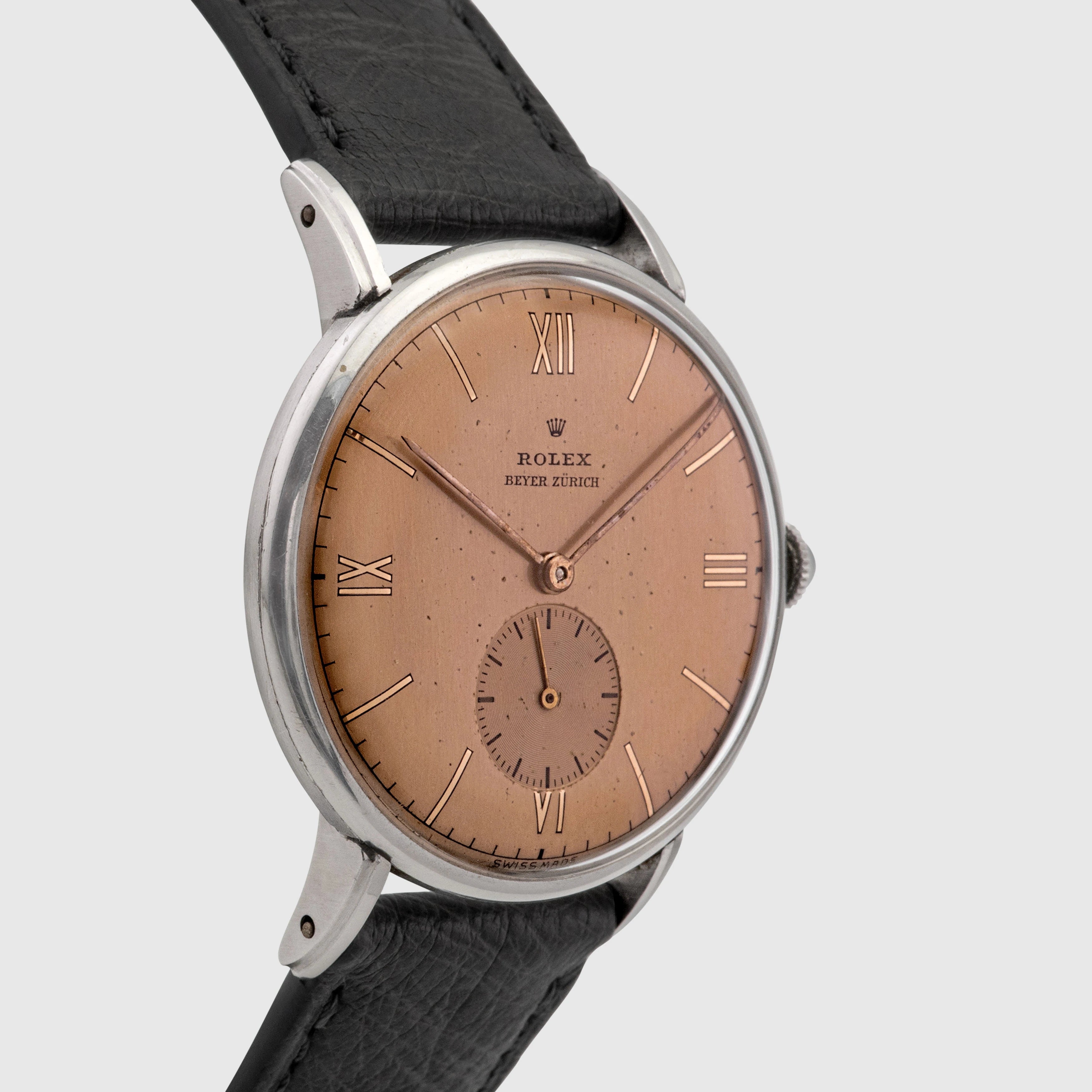 1940 Rolex Dress Watch Stainless Steel Salmon dial retailed by Beyer Ref. 4051