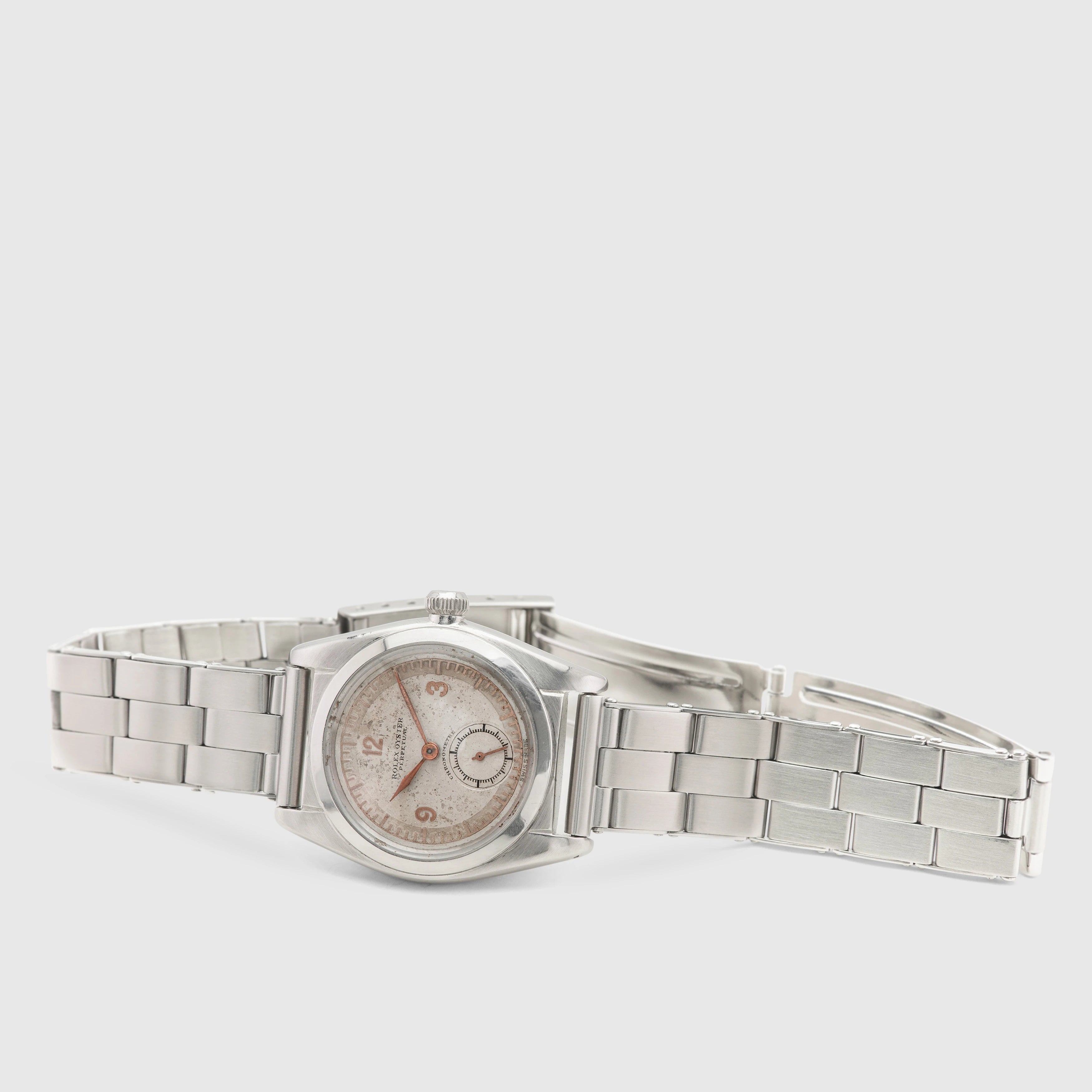 1941 Rolex Bubbleback Stainless Steel White & Pink Gold dial Ref. 2764