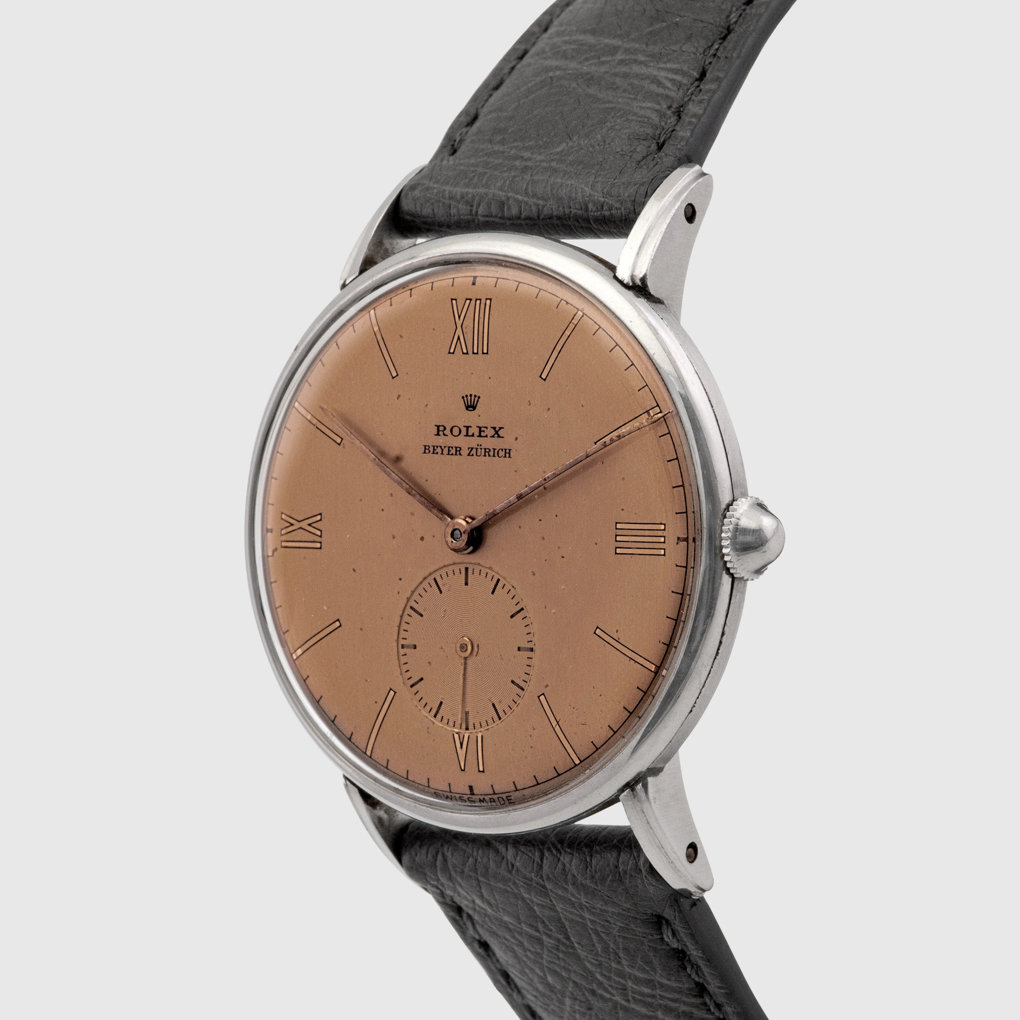 1940 Rolex Dress Watch Stainless Steel Salmon dial retailed by Beyer Ref. 4051