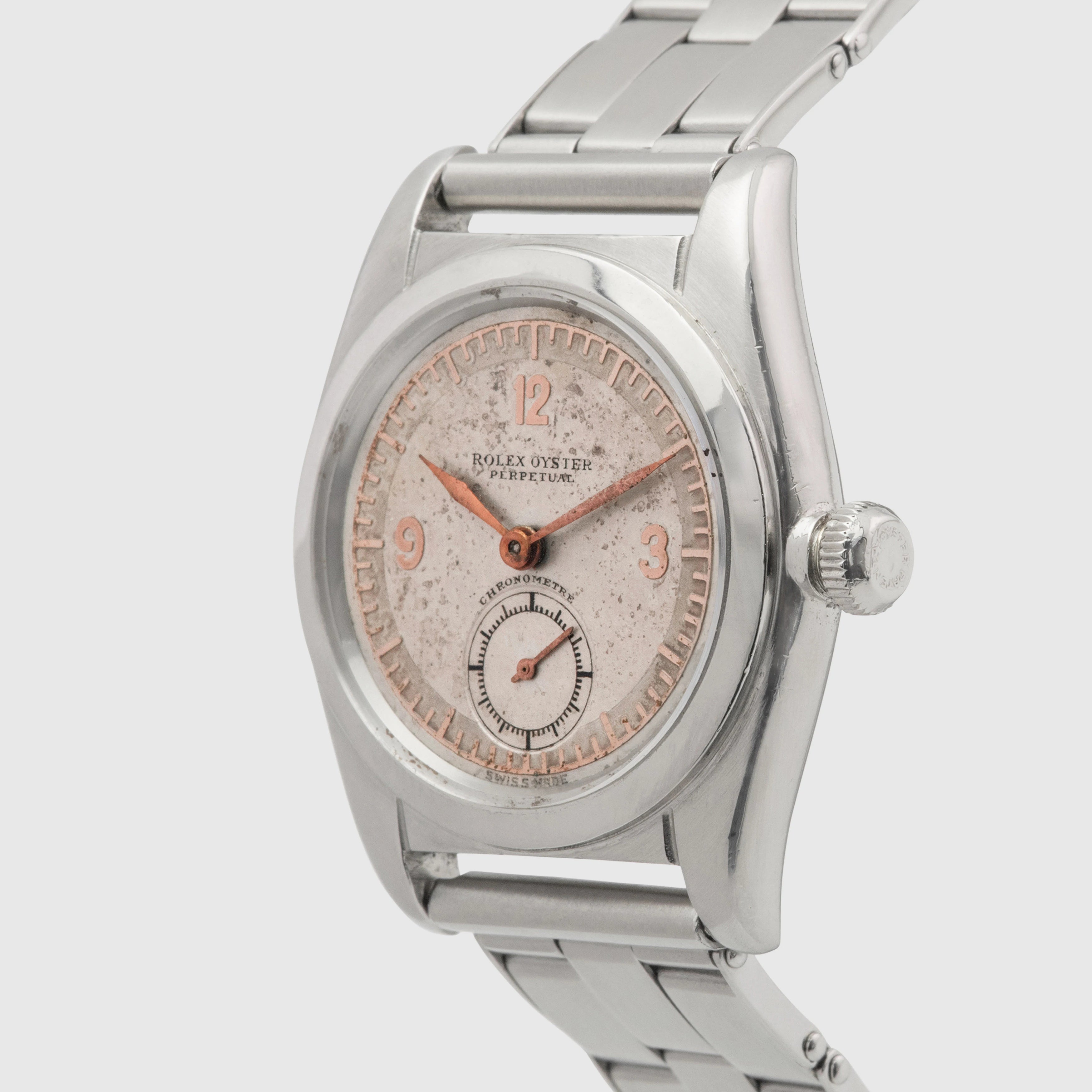 1941 Rolex Bubbleback Stainless Steel White & Pink Gold dial Ref. 2764