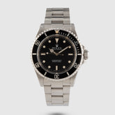 1990 Rolex Submariner Tritium Dial Ref. 14060 (with papers)