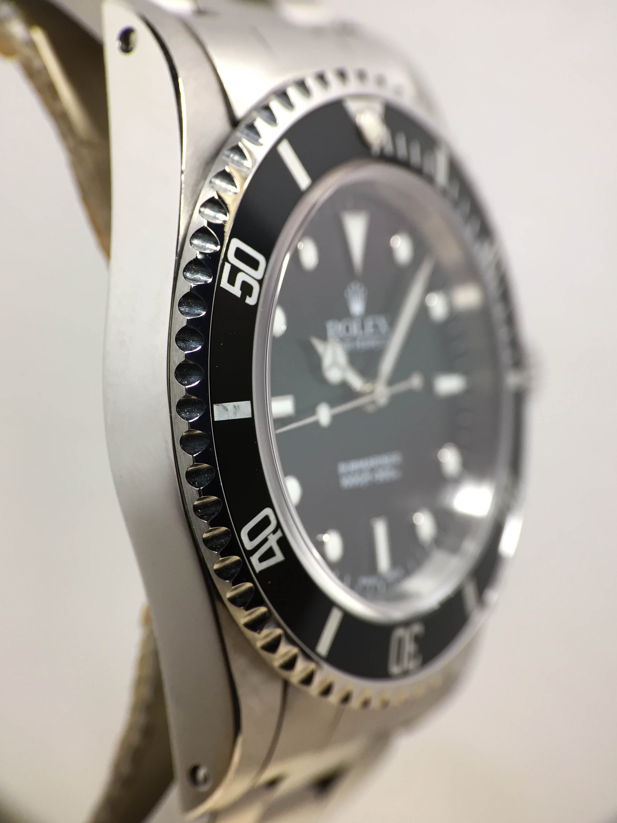 2003 Rolex Submariner No Date Ref. 14060M (with Box & Papers)