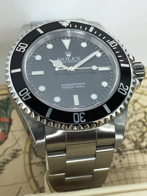 2003 Rolex Submariner No Date Ref. 14060M (with Box & Papers)