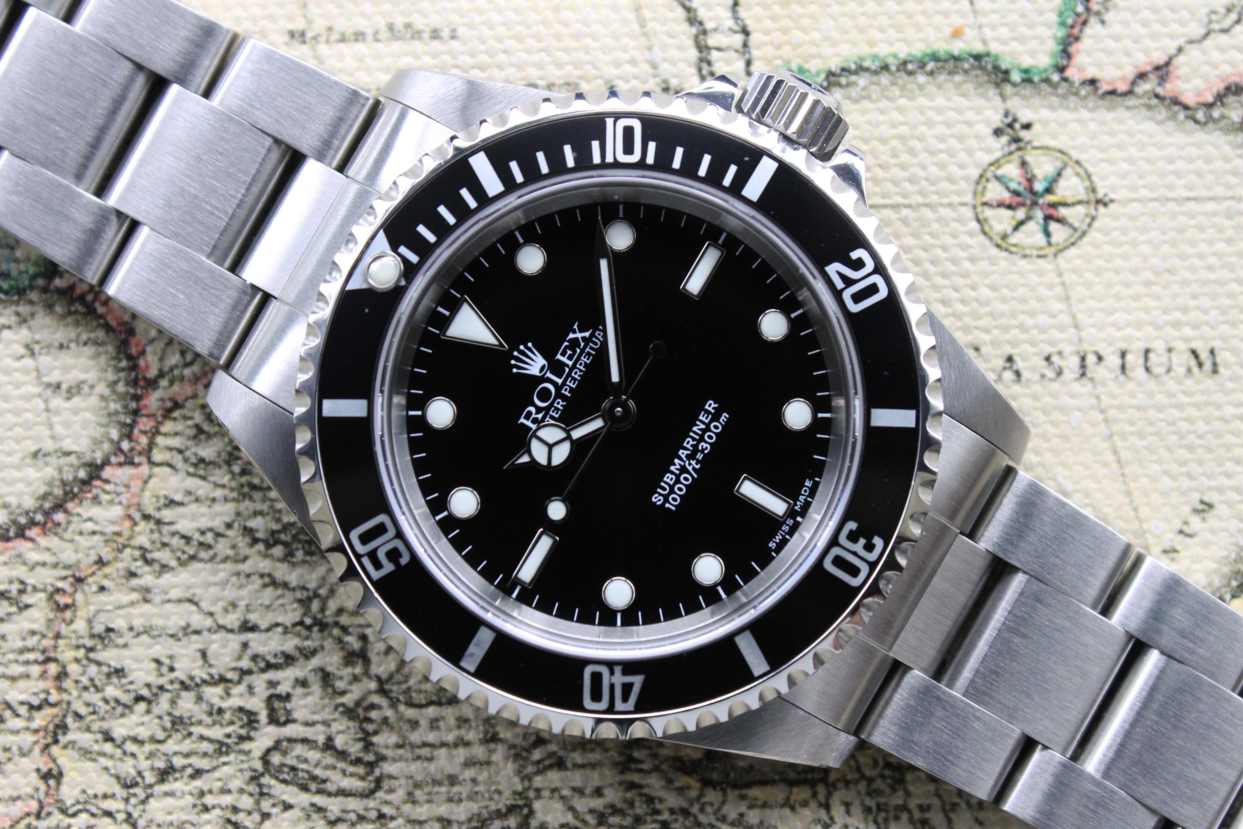 2003 Rolex Submariner No Date Ref. 14060M (with Box & Papers)