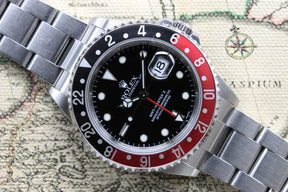 2005 Rolex GMT Master II Coke  Unpolished Ref. 16710 (with Papers)