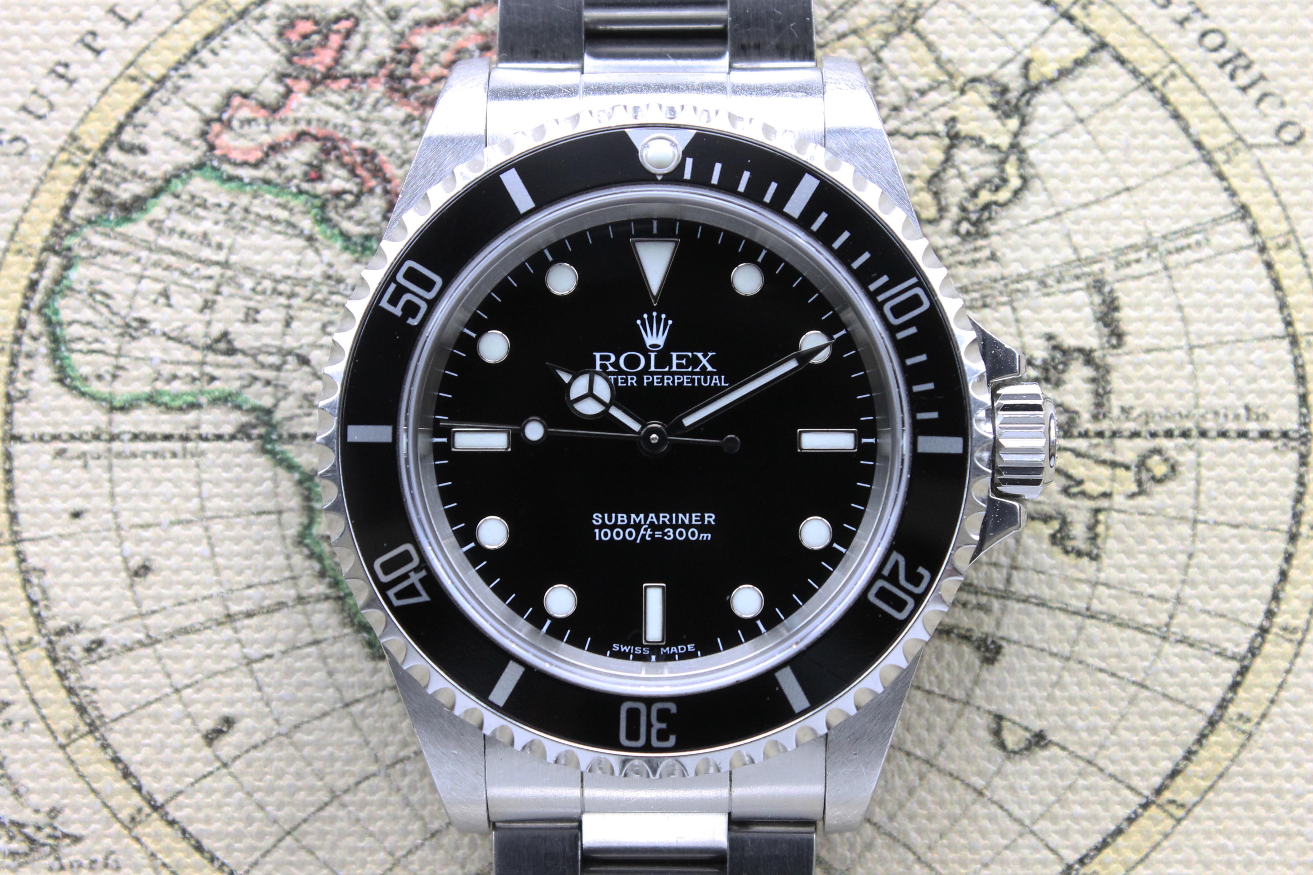 2004 Rolex Submariner Ref. 14060M (with Box & Papers)