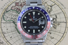 1985 - Rolex GMT Master Pepsi (With Box and Service papers from RSC UK 2009 - Momentum Dubai
