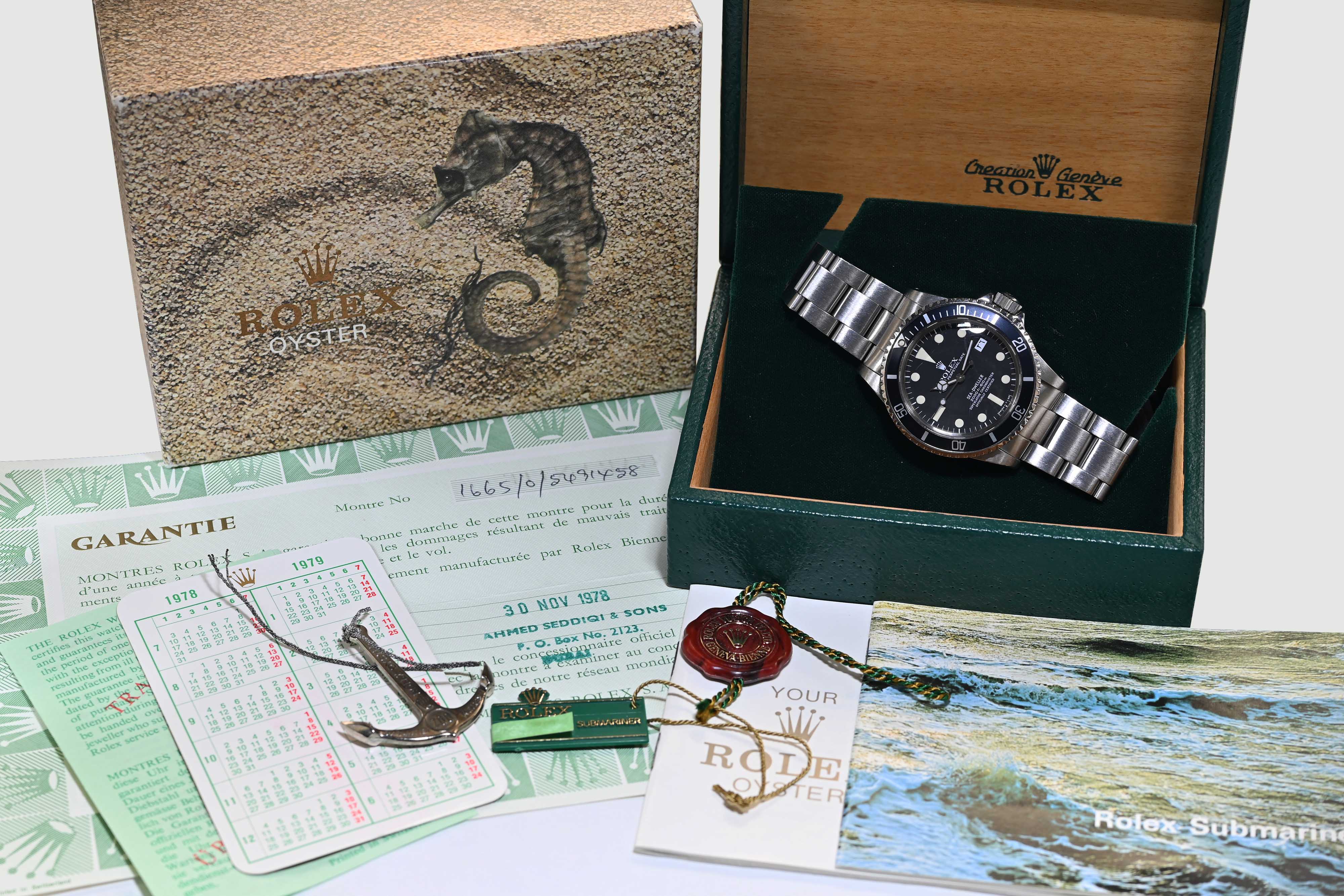 1978 ROLEX SEA DWELLER AHMED SEDDIQI & SONS REF. 1665 (SUPER FULL SET)