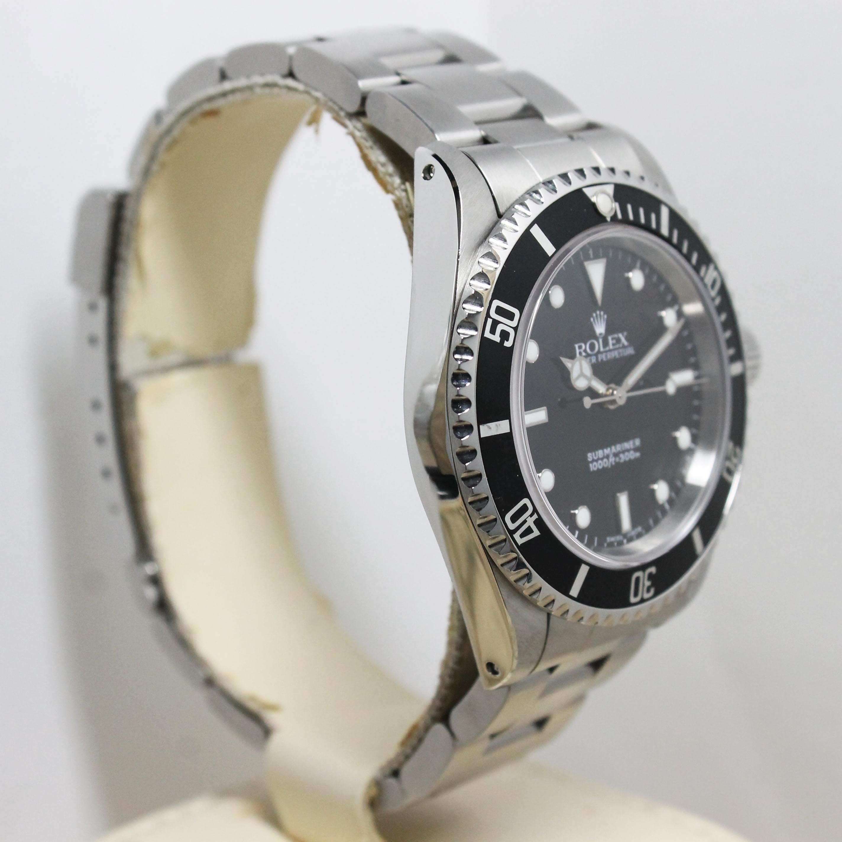 2003 Rolex Submariner No Date Ref. 14060M (with Box & Papers)