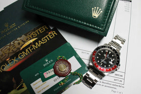 1990 - Rolex GMT Master II (box, RSC papers and booklets) - Momentum Dubai